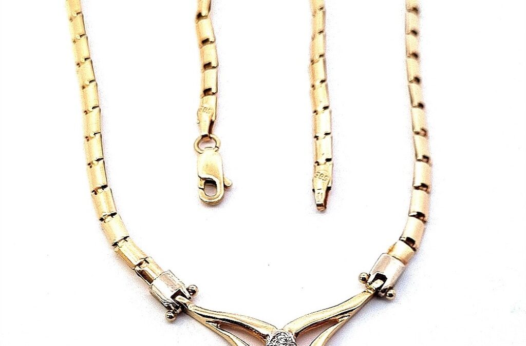 Zlatý náhrdelník se zirkony