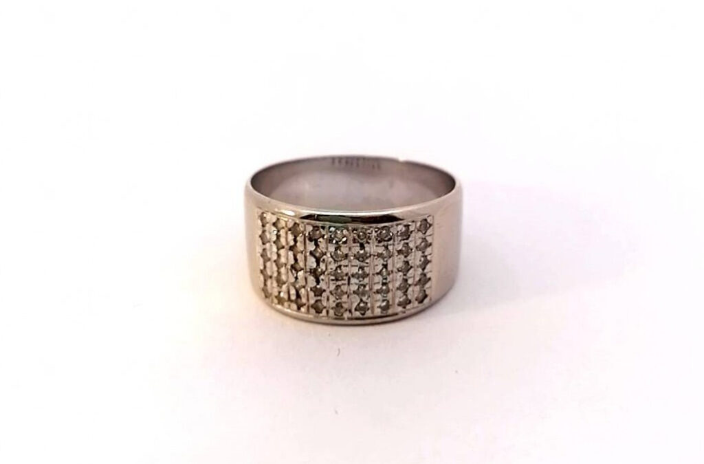 Prsten z bílého zlata se zirkony, vel. 56